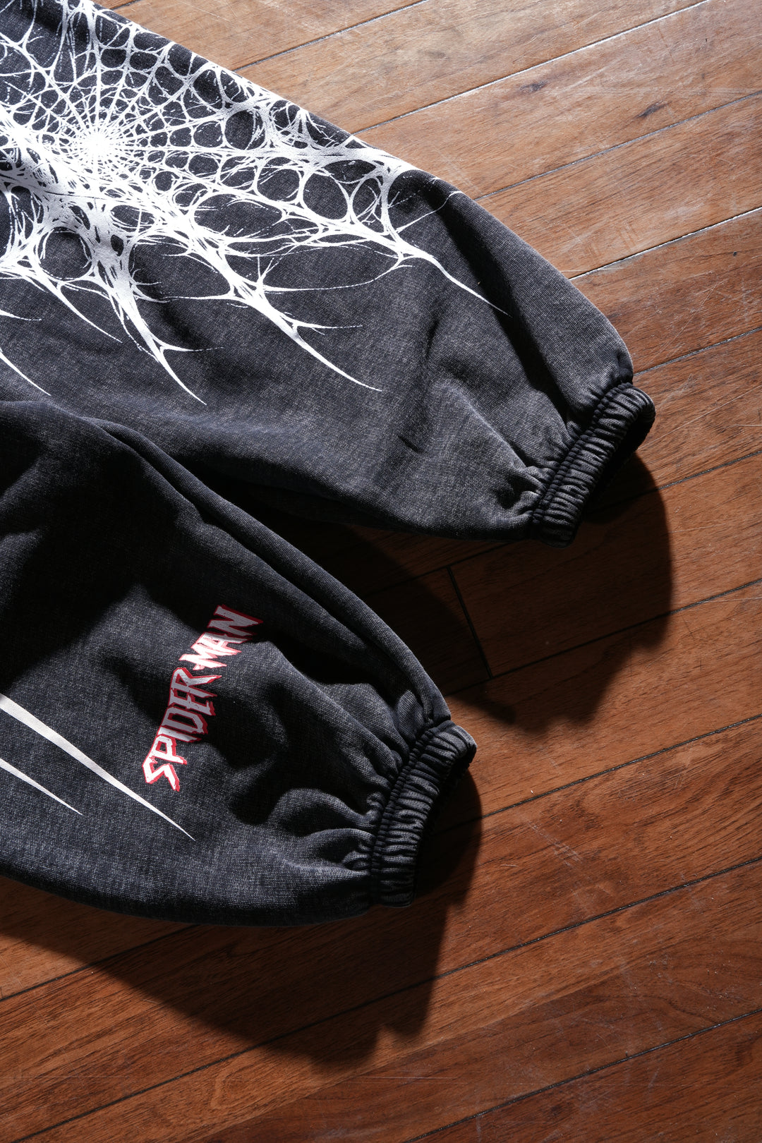 Web Sling Chaos Lounger Sweat Pants in Vintage Black