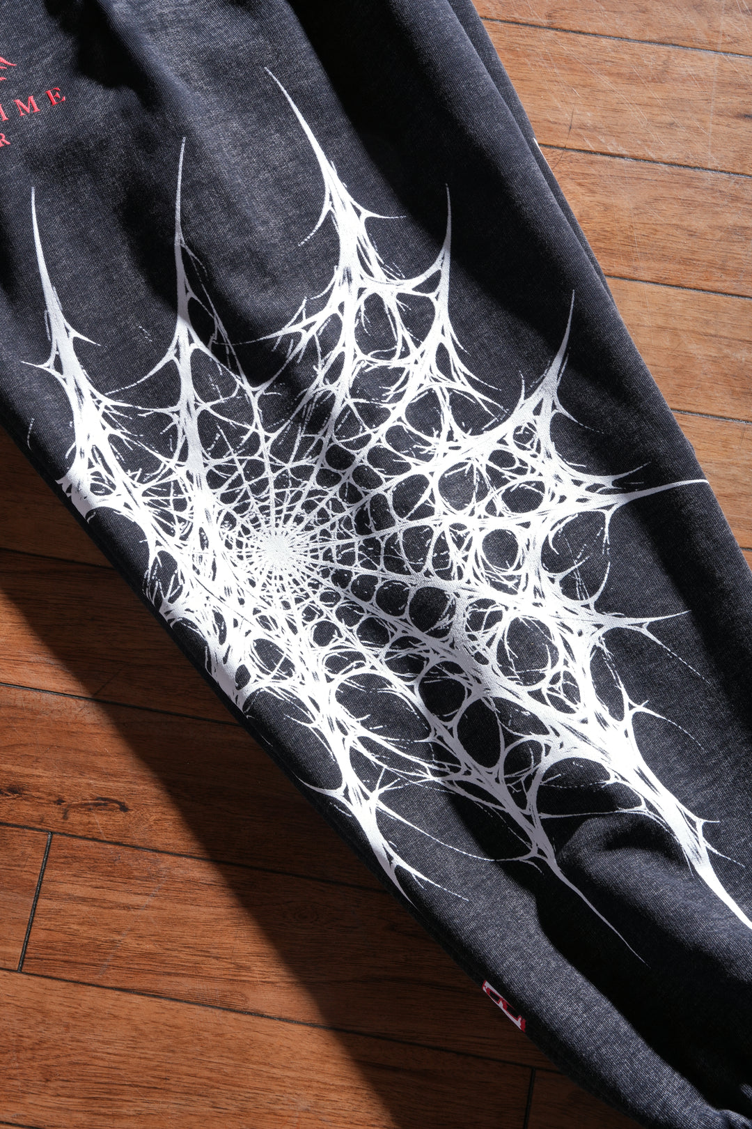 Web Sling Chaos Lounger Sweat Pants in Vintage Black