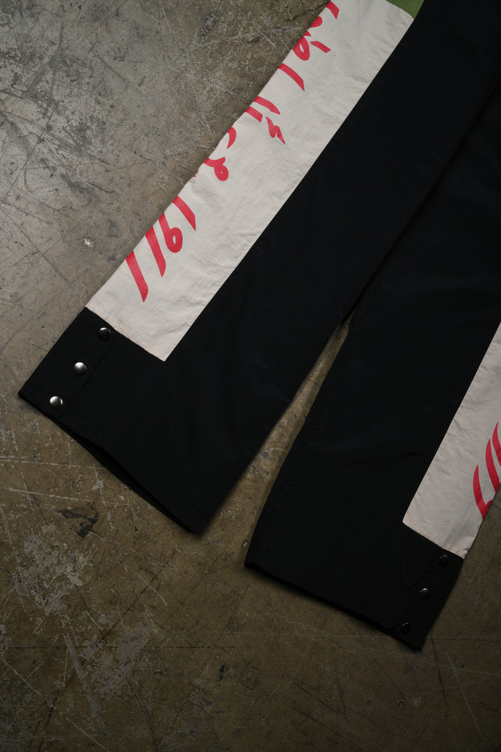 More Pain More Gain Track Pants in Black/All Over Print