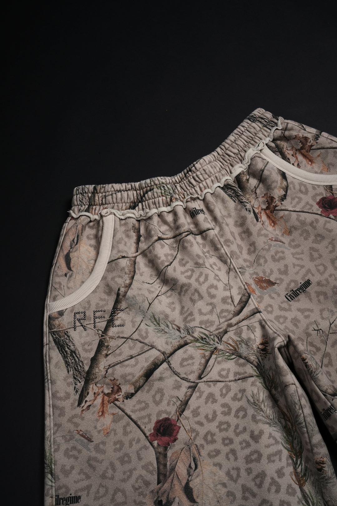 Concrete Sin Fleece Jorts in Sun Wash Real Leopard Camo