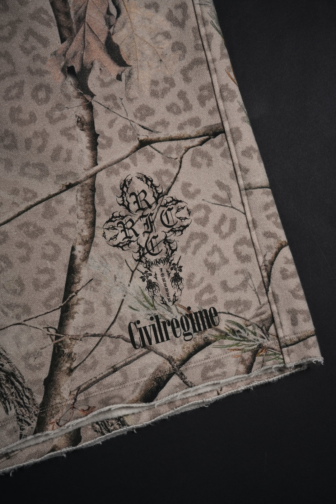 Concrete Sin Fleece Jorts in Sun Wash Real Leopard Camo