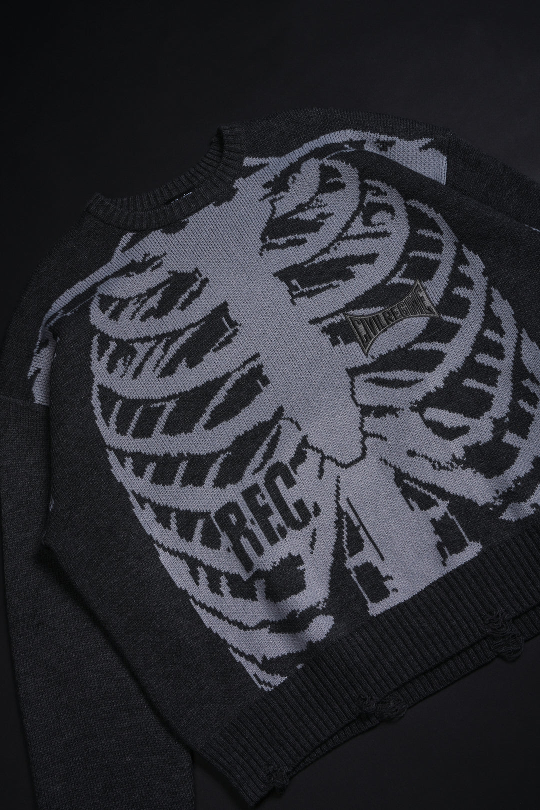 I Bite Cable Distressed Knit Sweater in Charcoal