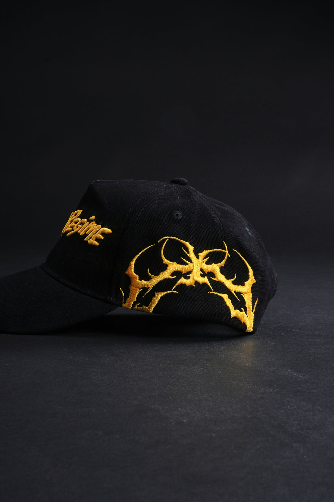 Regime 5 Panel Strapback Hat in Black