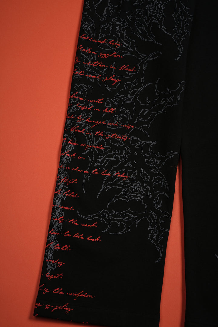 Chaos Is Policy Eternal Wide Leg Fleece Pants in Black
