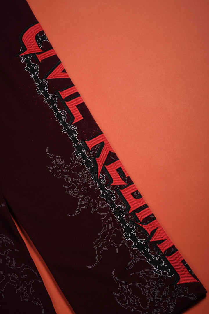 Chaos Is Policy Eternal Wide Leg Fleece Pants in Oxblood