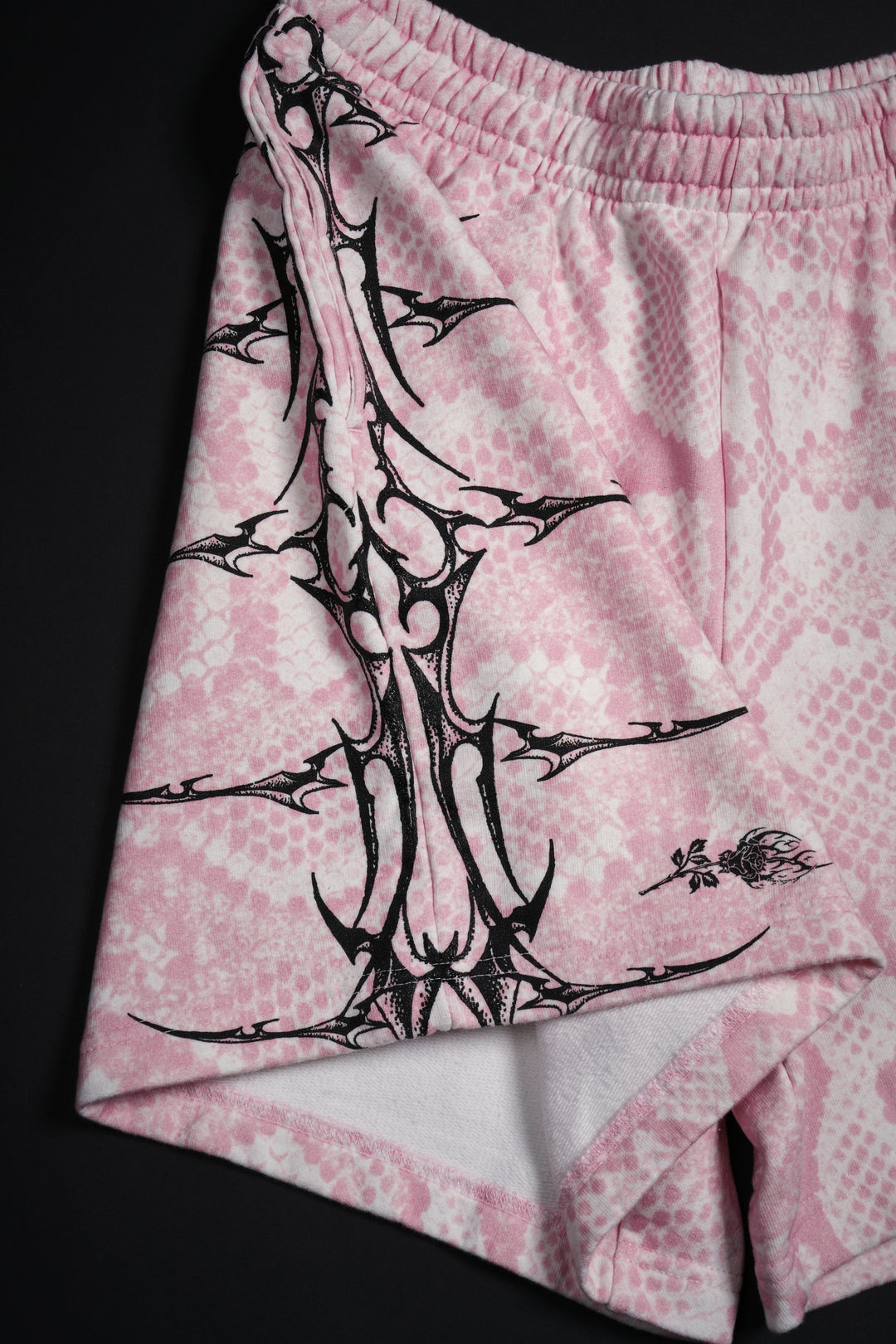 Core Brigade Baggy Shorts in Baby Pink Snake