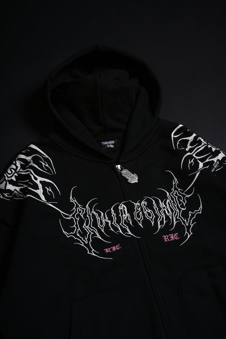 Surging Through The Blossoms Outliers Distressed Zip Up Hoodie in Black/Pink