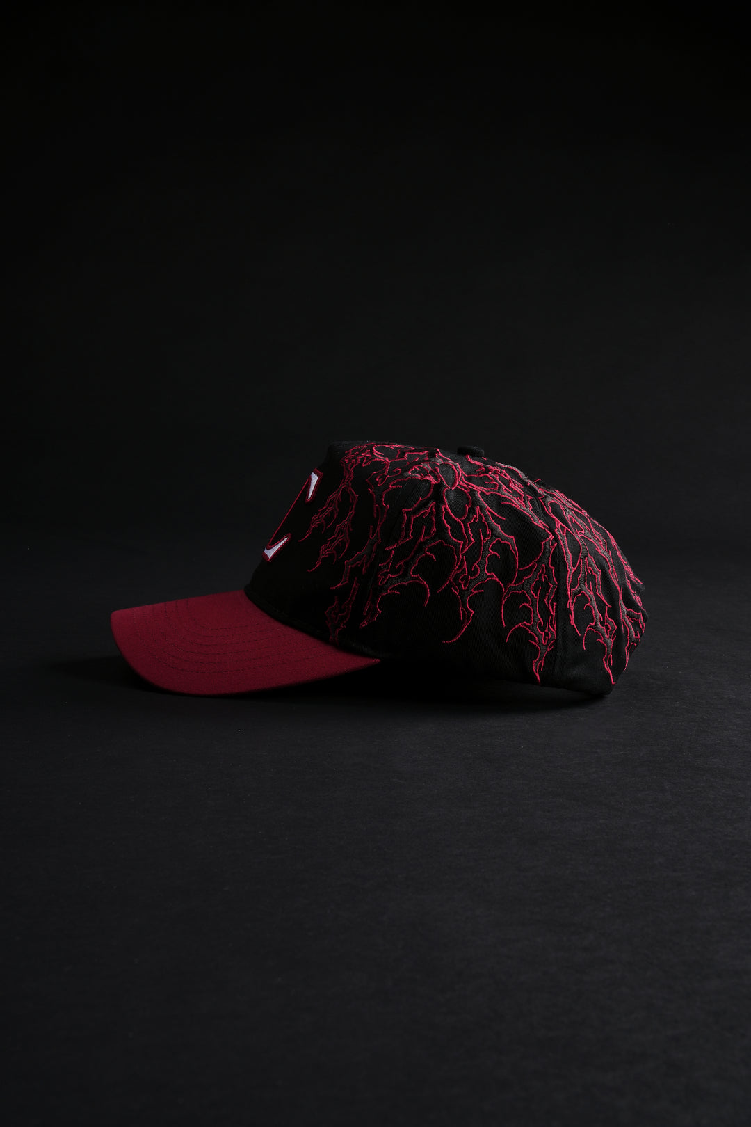 Hollow Veins 5 Panel Strapback Hat in Black/Cherry Red