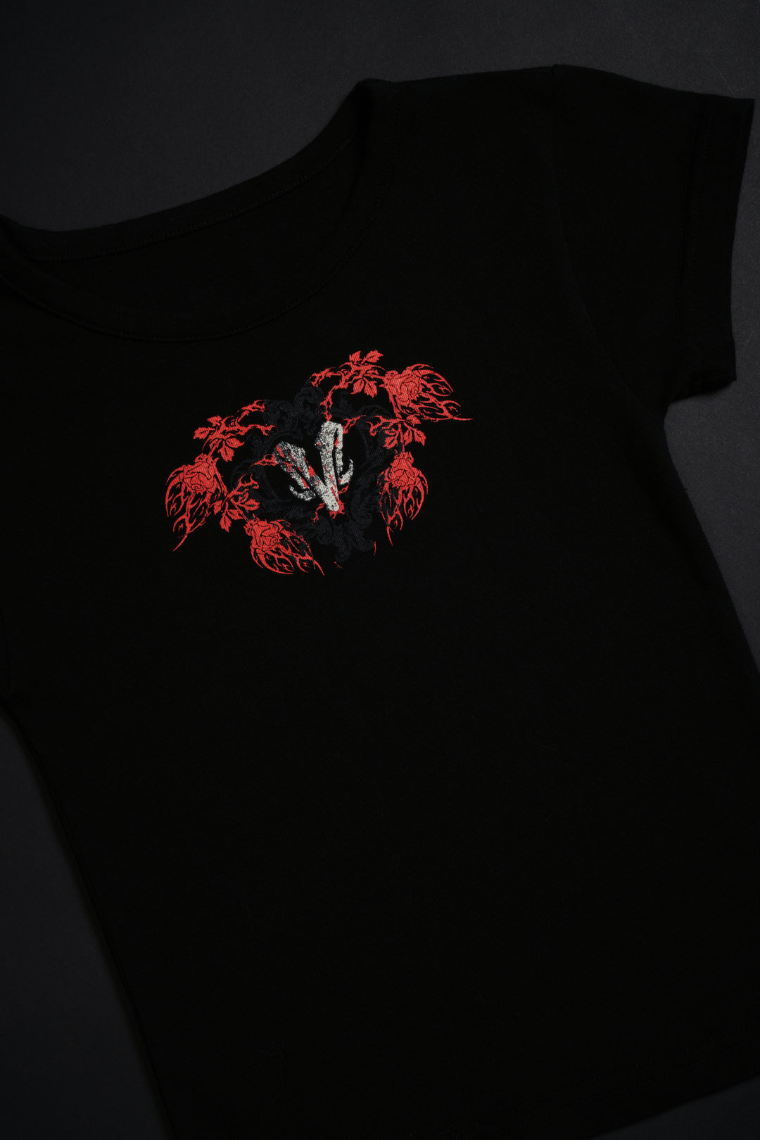 The Red Reign Baby Tee in Black