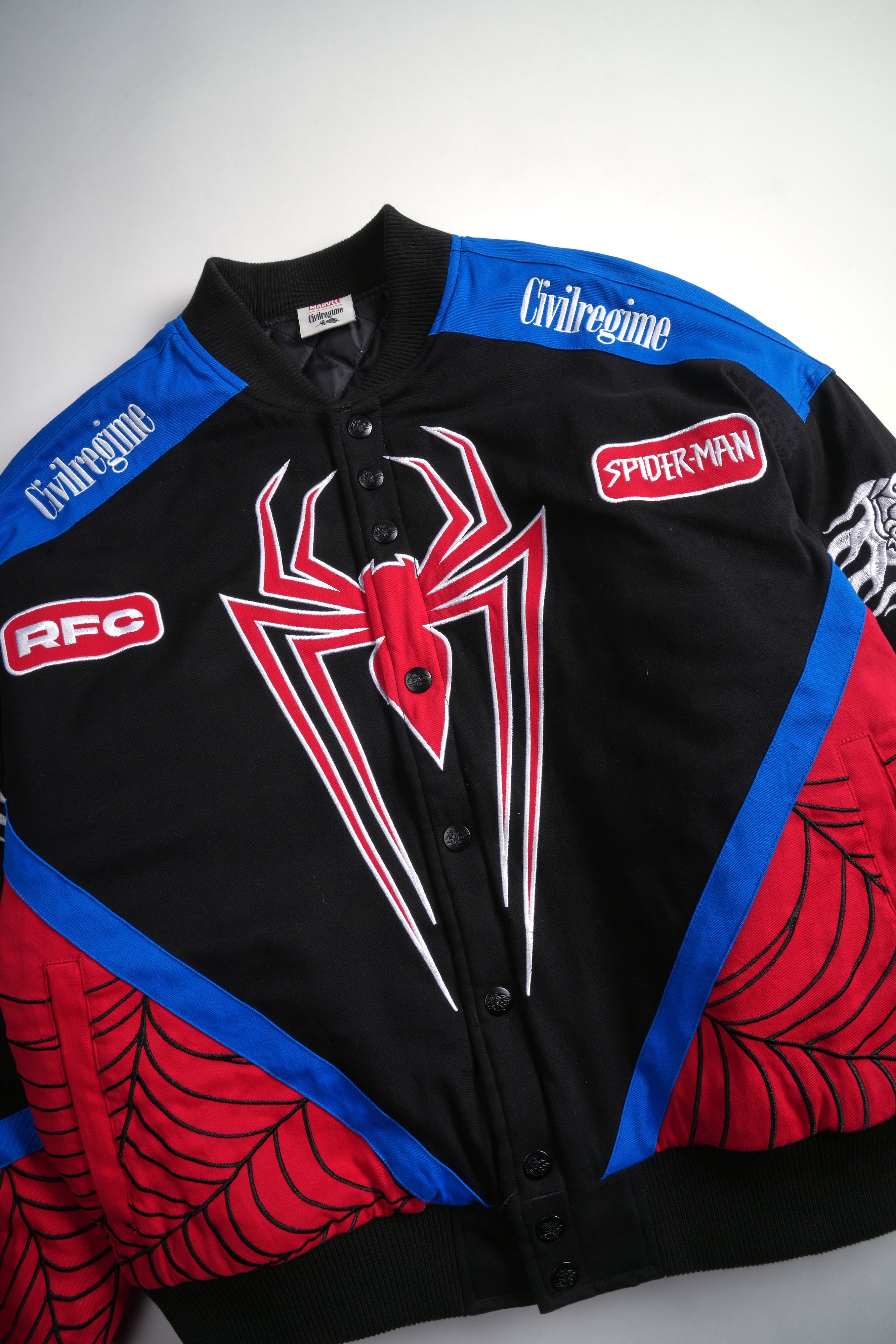 City Swinging Racing Jacket in Black/Blue/Red – Civil Regime