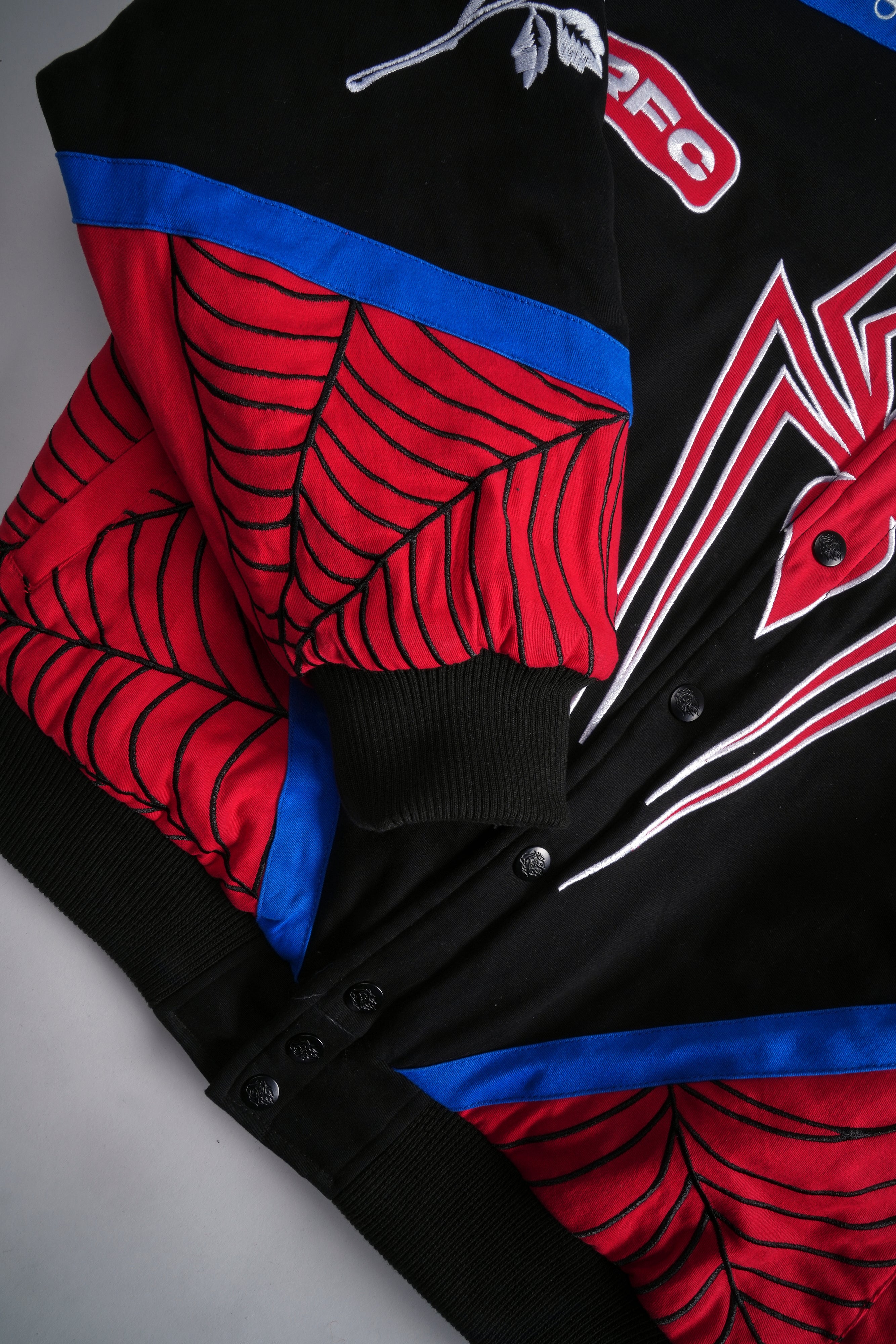 City Swinging Racing Jacket in Black/Blue/Red – Civil Regime