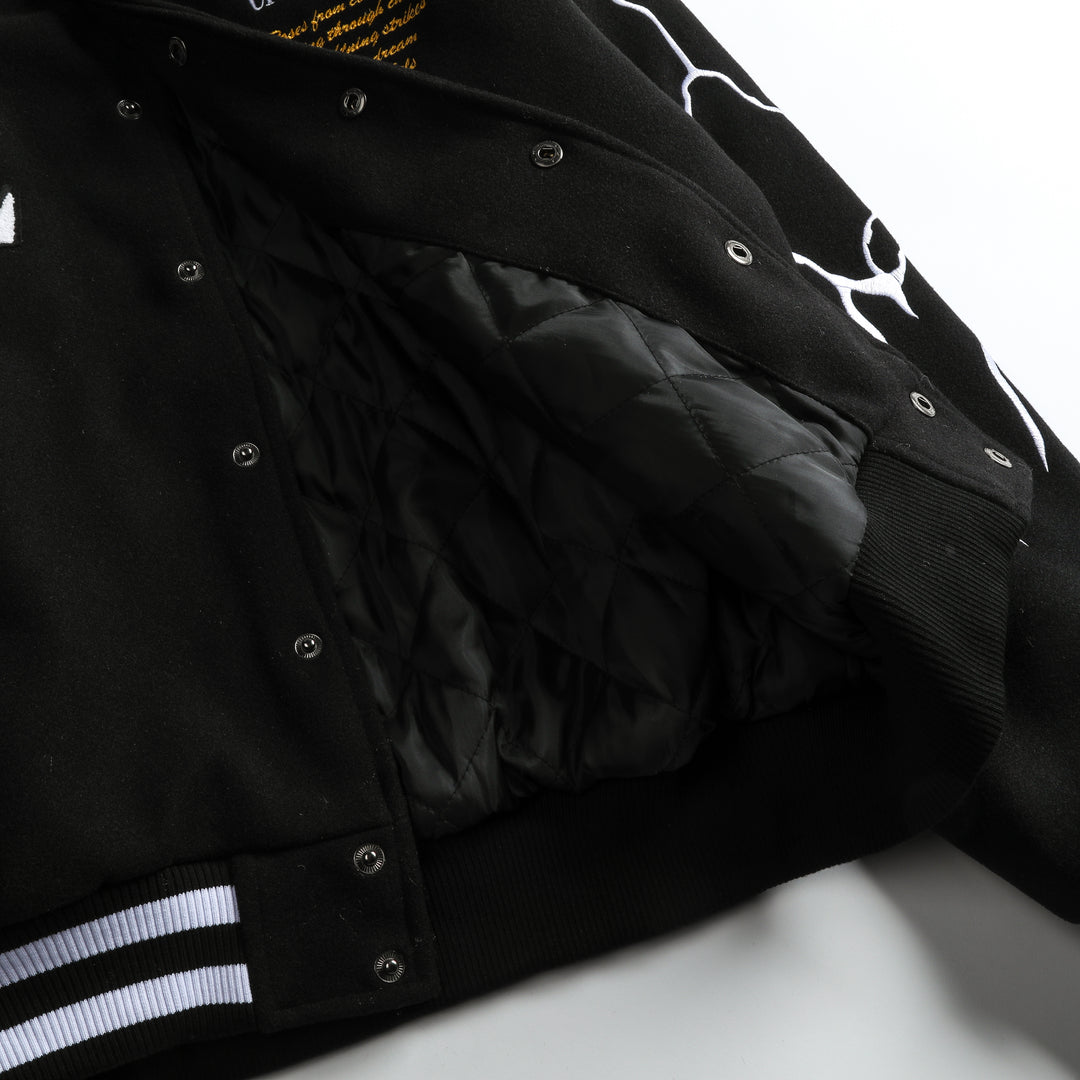 Night Strikes Varsity Jacket in Black