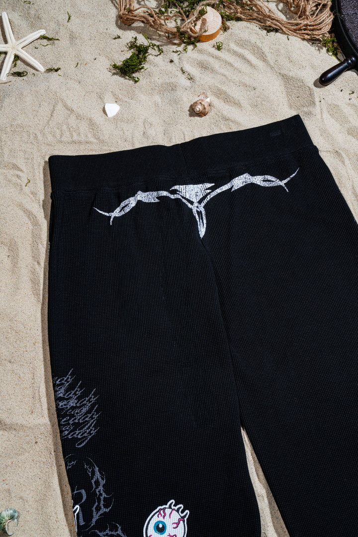 Doom Lagoon Waffle Thermal Flared Leggings in Black